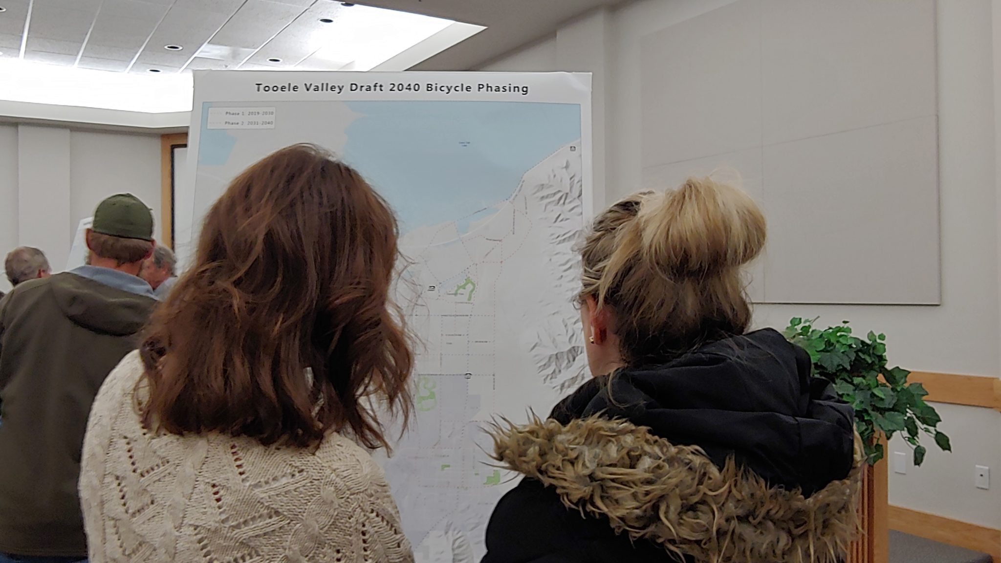 Community members view a map at the Tooele Valley Long-Range Transportation Plan Open House.